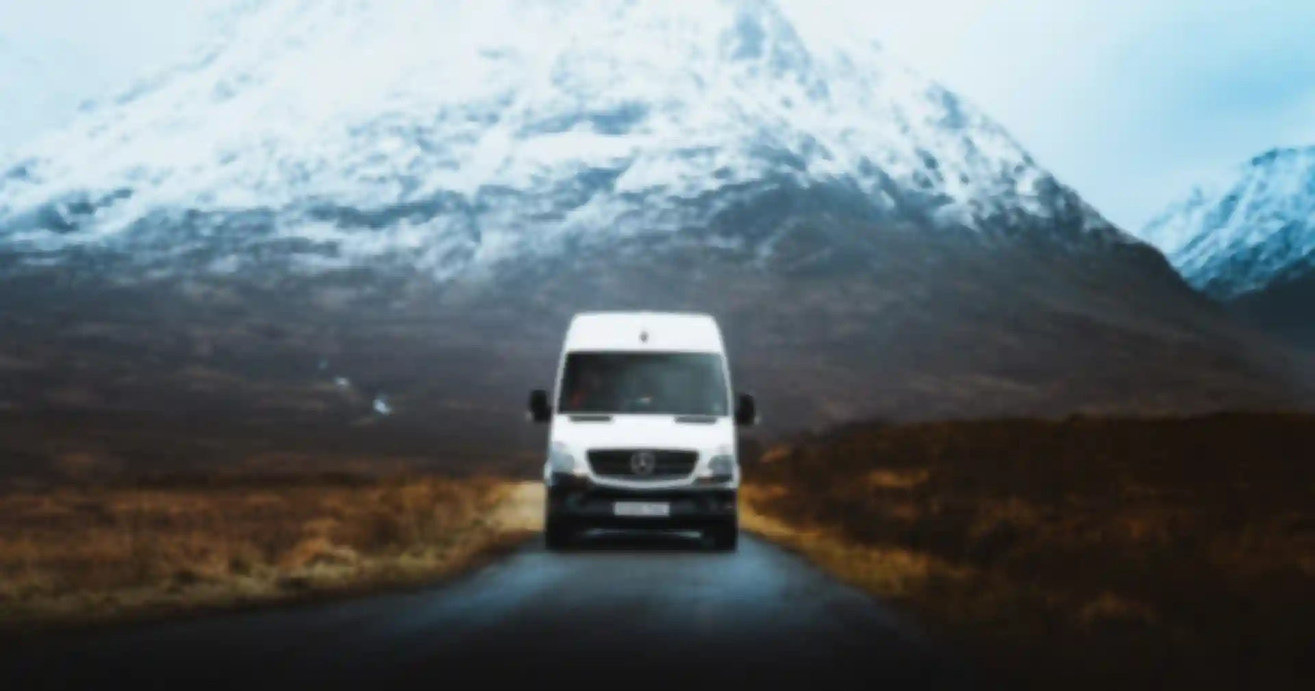 white Campervan vehicle on road during day
