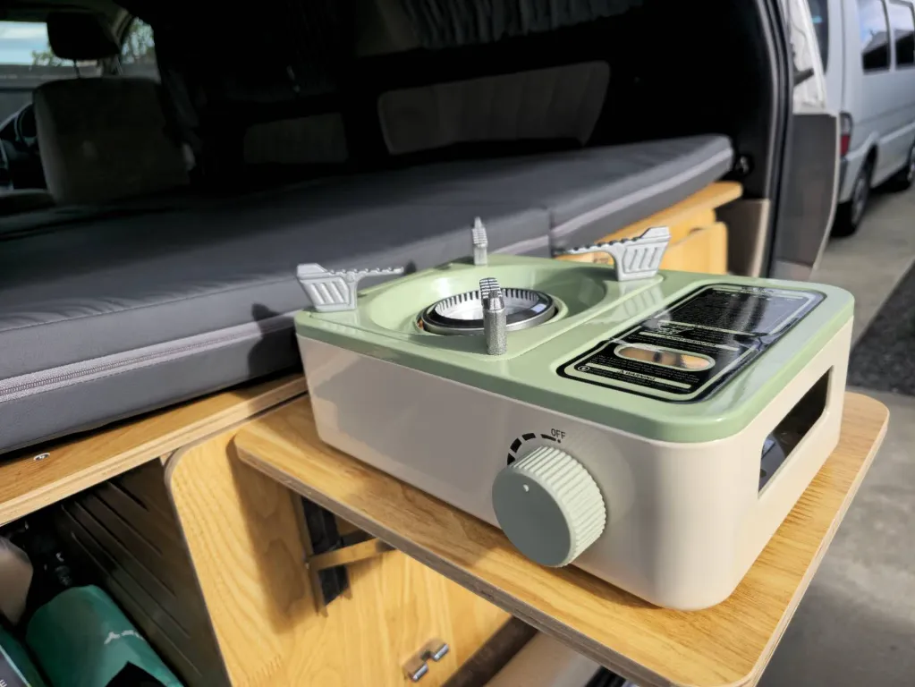 Qube Gas Stove in Campervan on Table.webp